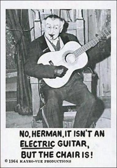 Munsters (Base Set) card 3 No, Herman, it isn't an Electric Guitar, but the